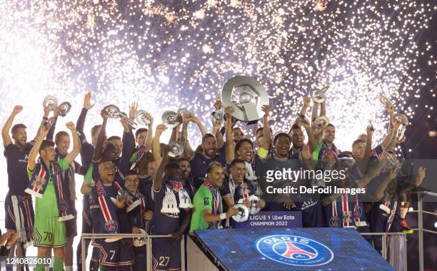 Marcos Correa of Paris Saint Germain with his teammates celebrating with 2022 Ligue 1 winners trophy after the Ligue 1 Uber Eats match between Paris...
