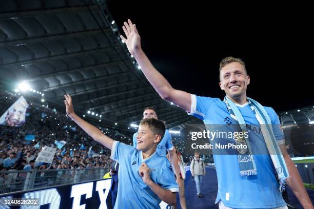 Lucas Leiva of SS Lazio greets his supporters as he plays his last match for the club during the Serie A match between SS Lazio and Hellas Verona on...