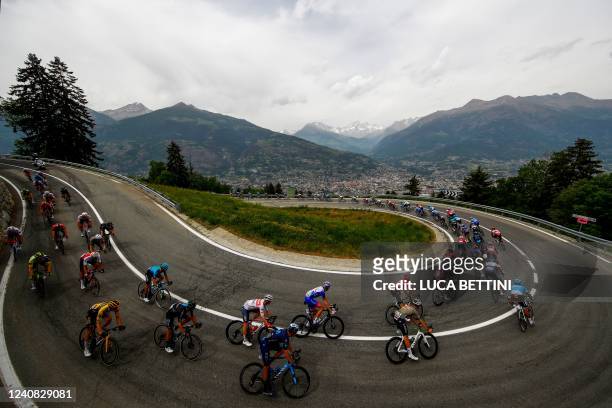 Riders cycle down towards Aosta during the 15th stage of the Giro d'Italia 2022 cycling race, 177 kilometers from Rivarolo Canavese, Piedmont, to...