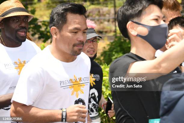 Manny Pacquiao attends the charity marathon event to provide shelters for the children in the Philippines at City Football Station on May 22, 2022 in...