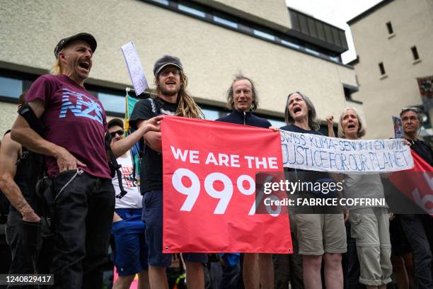 Protesters take part in a demonstration against the World Economic Forum during the WEF annual meeting in Davos on May 22, 2022.