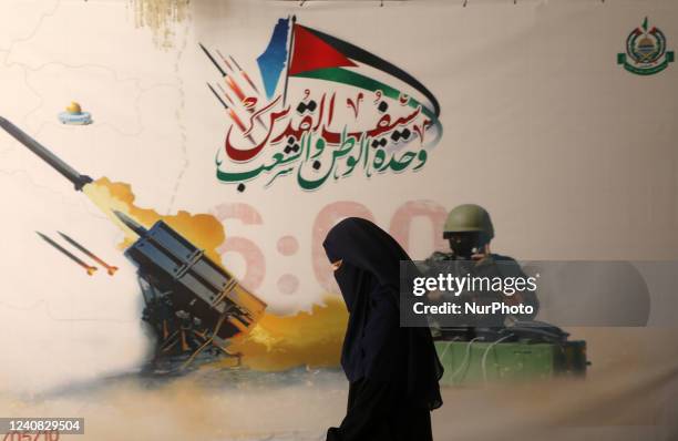 Palestinian supporters of Hamas movement attend the national conference on the first anniversary of the May 2021 conflict between Israel and Hamas in...