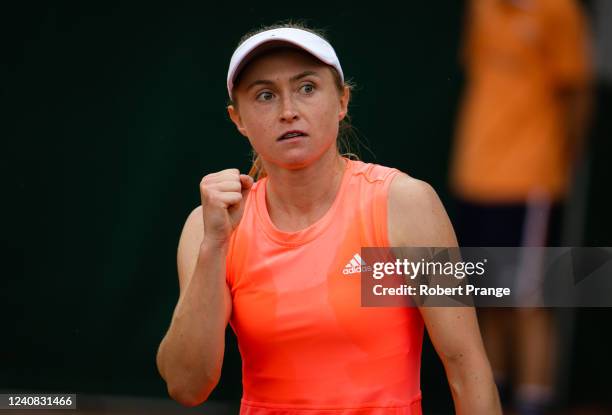 Aliaksandra Sasnovich of Belarus in action against Xinyu Wang of China in her first round match on Day 1 at Roland Garros on May 22, 2022 in Paris,...