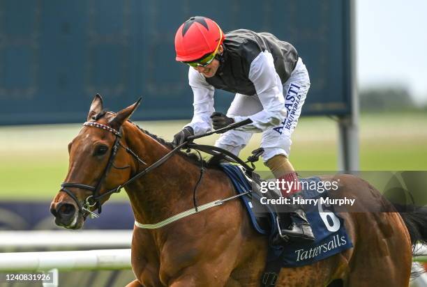 Kildare , Ireland - 22 May 2022; Chris Hayes celebrates on Homeless Songs after winning the Tattersalls Irish 1,000 Guineas during the Tattersalls...