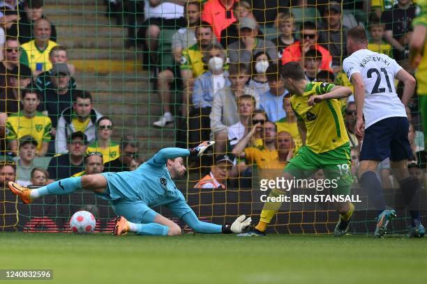 Tottenham Hotspur's Swedish midfielder Dejan Kulusevski scores his team's first goal during the English Premier League football match between Norwich...