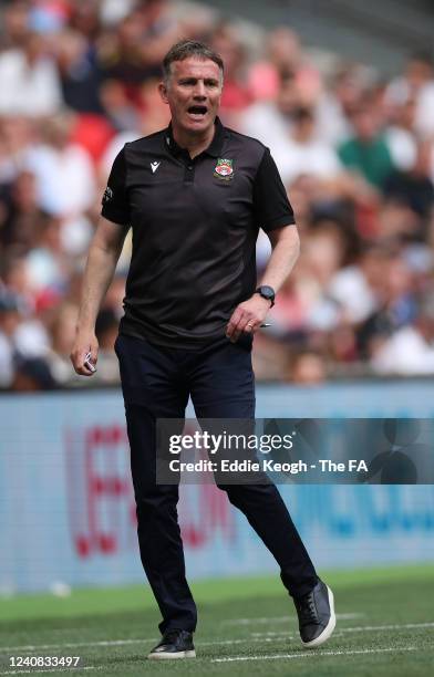 Phil Parkinson, Manager of Wrexham gestures from the side line during the Buildbase FA Trophy Final between Bromley and Wrexham at Wembley Stadium on...