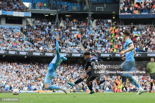 Philippe Coutinho of Aston Villa scores their 2nd goal during the Premier League match between Manchester City and Aston Villa at Etihad Stadium on...