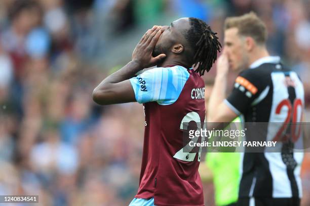 Burnley's Ivorian defender Maxwel Cornet reacts to a missed chance during the English Premier League football match between Burnley and Newcastle...