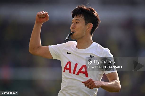 Tottenham Hotspur's South Korean striker Son Heung-Min celebrates at the end of the English Premier League football match between Norwich City and...