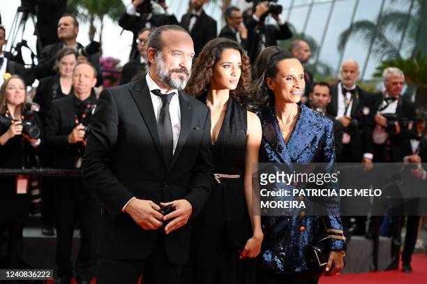 French actor Vincent Perez , his wife film director and screenwriter Karine Silla and their daughter Iman Perez arrive for the screening of the film...