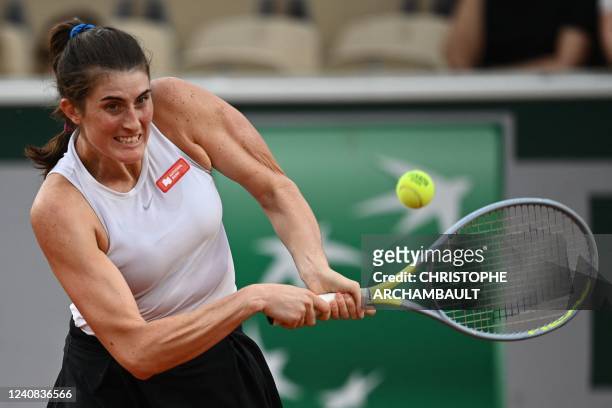 Canada's Rebecca Marino returns to US' Coco Gauff during their women's singles match on day one of the Roland-Garros Open tennis tournament in Paris...