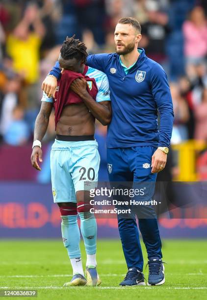 Burnley's Maxwel Cornet and Erik Pieters leave the field dejected after the Premier League match between Burnley and Newcastle United at Turf Moor on...