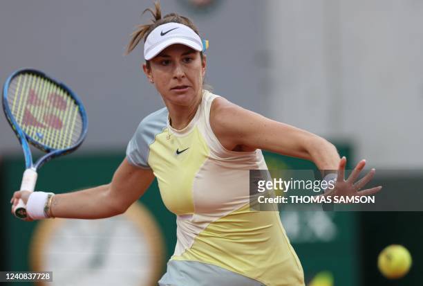 Switzerland's Belinda Bencic returns the ball to Hungary's Reka-Luca Jani during their women's singles match on day one of the Roland-Garros Open...