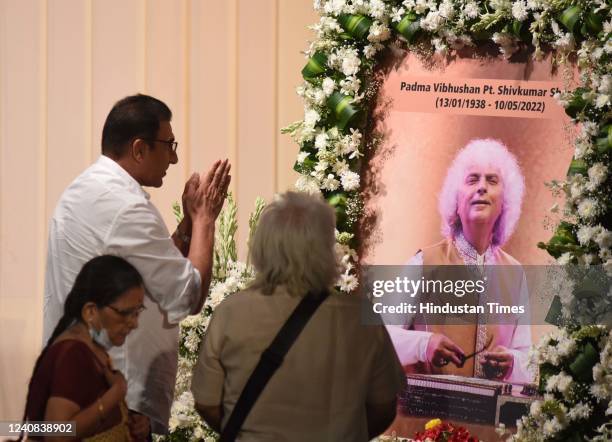 Bollywood actor Mukesh Rishi arrives to attend the prayer meeting for late legendary Indian composer and santoor player Shiv Kumar Sharma at ISKCON...