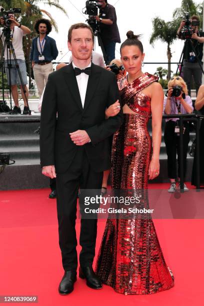 German-born Irish actor Michael Fassbender and Swedish actress Alicia Vikander attend the screening of "Holy Spider" during the 75th annual Cannes...