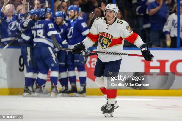 Noel Acciari of the Florida Panthers reacts as members of the Tampa Bay Lightning celebrate a goal during the first period in Game Three of the...