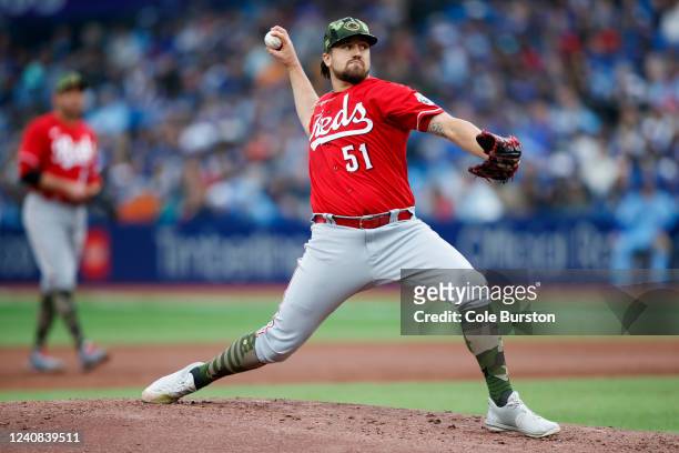 Graham Ashcraft of the Cincinnati Reds pitches in the first inning of their MLB game against the Toronto Blue Jays at Rogers Centre on May 22, 2022...