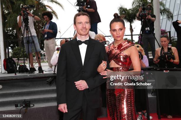 German-born Irish actor Michael Fassbender and Swedish actress Alicia Vikander attend the screening of "Holy Spider" during the 75th annual Cannes...