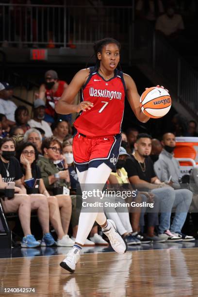 Ariel Atkins of the Washington Mystics handles the ball during the game against the Chicago Sky on May 22, 2022 at Capital One Arena in Washington,...