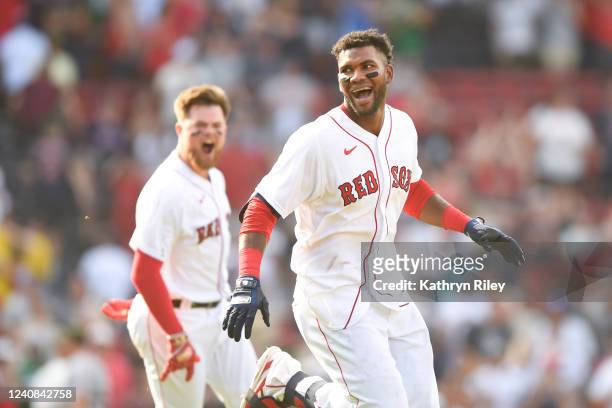 Franchy Cordero of the Boston Red Sox celebrates after hitting a walk-off grand slam in the tenth inning against the Seattle Mariners at Fenway Park...