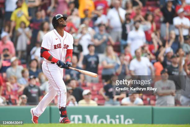Franchy Cordero of the Boston Red Sox hits a walk off grand slam in the tenth inning against the Seattle Mariners at Fenway Park on May 22, 2022 in...