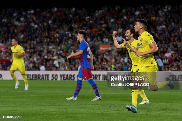 Villarreal's Spanish midfielder Moises Gomez celebrates after scoring his team's second goal during the Spanish League football match between FC...