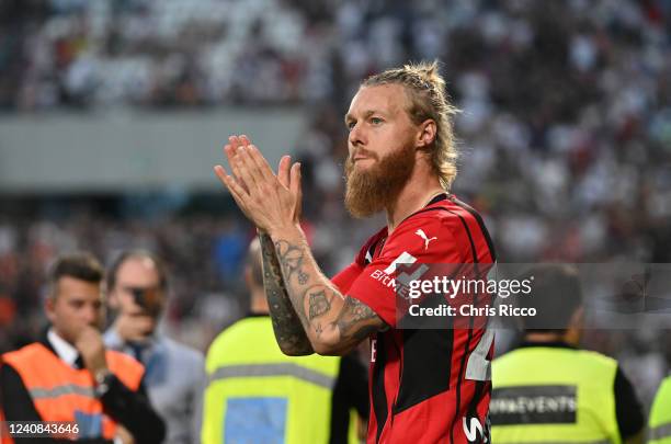 Simon Kjaer of AC Milan celebrates after their side finished the season as Serie A champions during the Serie A match between US Sassuolo and AC...