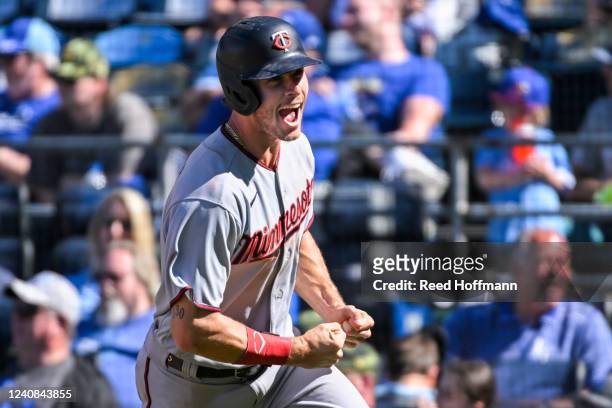 Max Kepler of the Minnesota Twins celebrates after scoring the game-winning run in their 7-6 victory over the Kansas City Royals during the ninth...