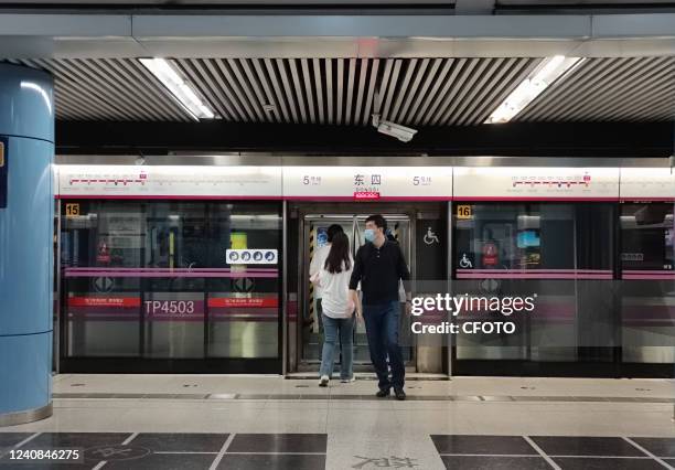 Passengers travel by subway at Hepingli North Street Station on Line 5 in Beijing, Capital of China, May 23, 2022. Some subway stations in Beijing...