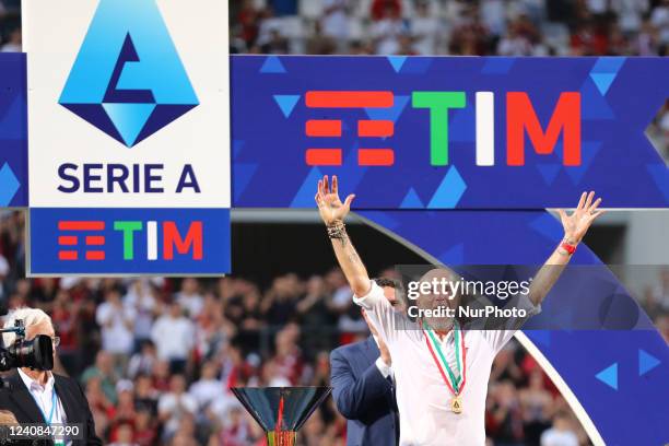 Stefano Pioli head coach of AC MILAN celebrates the trophy during the Serie A match between US Sassuolo and AC Milan at Mapei Stadium-Citta del...