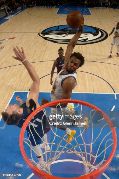 Andrew Wiggins of the Golden State Warriors dunks the ball during Game 3 of the 2022 NBA Playoffs Western Conference Finals against the Dallas...