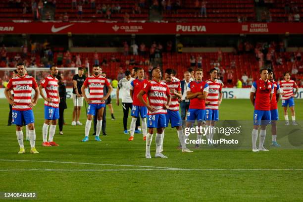 Players of GranadaCF react after they descend to second division during the La Liga match between Granada CF and RCD Espanyol at Nuevo Los Carmenes...