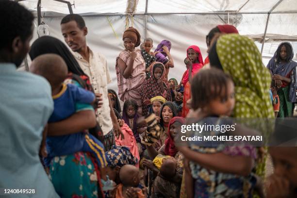 Internally displaced women from the internally displaced persons camp of Guyah, 100 kms of Semera, Afar region, Ethiopia wait to have their children...