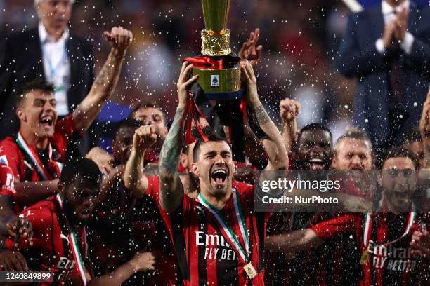 Alessio Romagnoli and his teammates celebrate lifting the trophy after winning the SERIE A championship during the italian soccer Serie A match US...