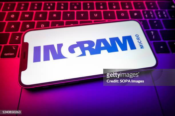 In this photo illustration, an Ingram Micro logo is displayed on the screen of a smartphone.