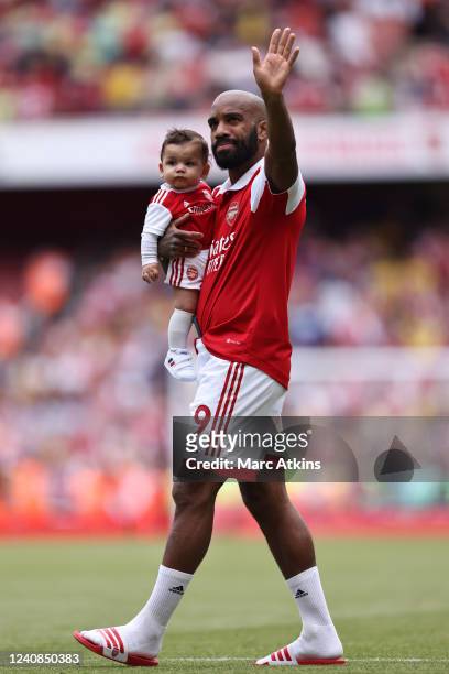 Alexandre Lacazette of Arsenal takes part in a lap of honour after the Premier League match between Arsenal and Everton at Emirates Stadium on May...