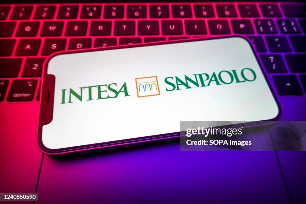 In this photo illustration, an Intesa Sanpaolo logo is displayed on a smartphone.