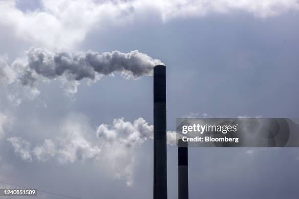 Chimenys emit vapor at the Scholven coal-fired power plant operated by Uniper SE in Gelsenkirchen, Germany, on Saturday, May 21, 2022. S&P Global...