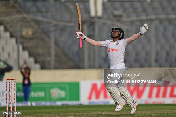 Bangladesh's Mushfiqur Rahim celebrates after scoring a century during the first day of the second Test cricket match between Bangladesh and Sri...