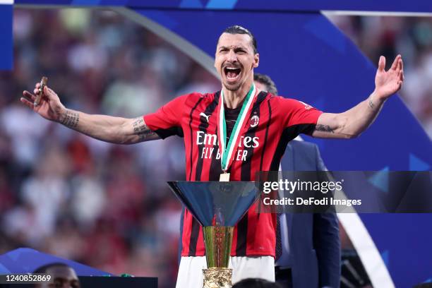 Zlatan Ibrahimovic of AC Milan celebrates with the cup after winning the championship after the Serie A match between US Sassuolo and AC Milan at...