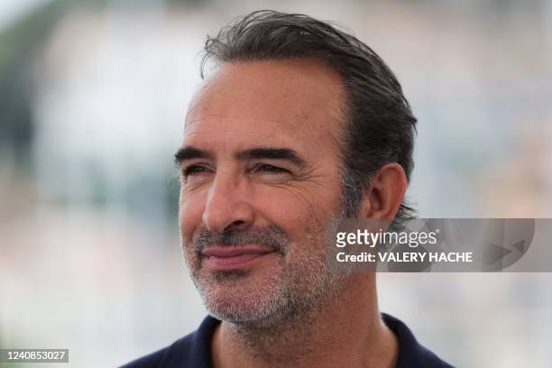 French actor Jean Dujardin attends a photocall for the film "November " during the 75th edition of the Cannes Film Festival in Cannes, southern...