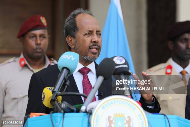 Somalia's new President, Hassan Sheikh Mohamud, gestures as he speaks during a handover ceremony at the Mogadishu palace on May 23, 2022.