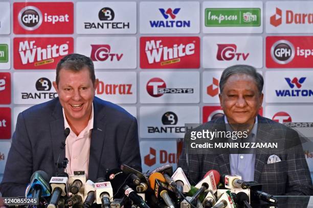 Chairman of the International Cricket Council Greg Barclay speaks as Bangladesh Cricket Board President Nazmul Hassan Papon watches during a press...