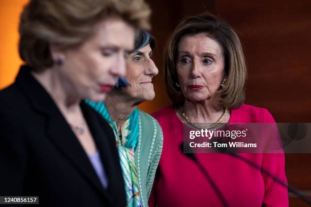 From left, Sen. Debbie Stabenow, D-Mich., Rep. Rosa DeLauro, D-Conn., and Speaker of the House Nancy Pelosi, D-Calif., conduct a news conference in...