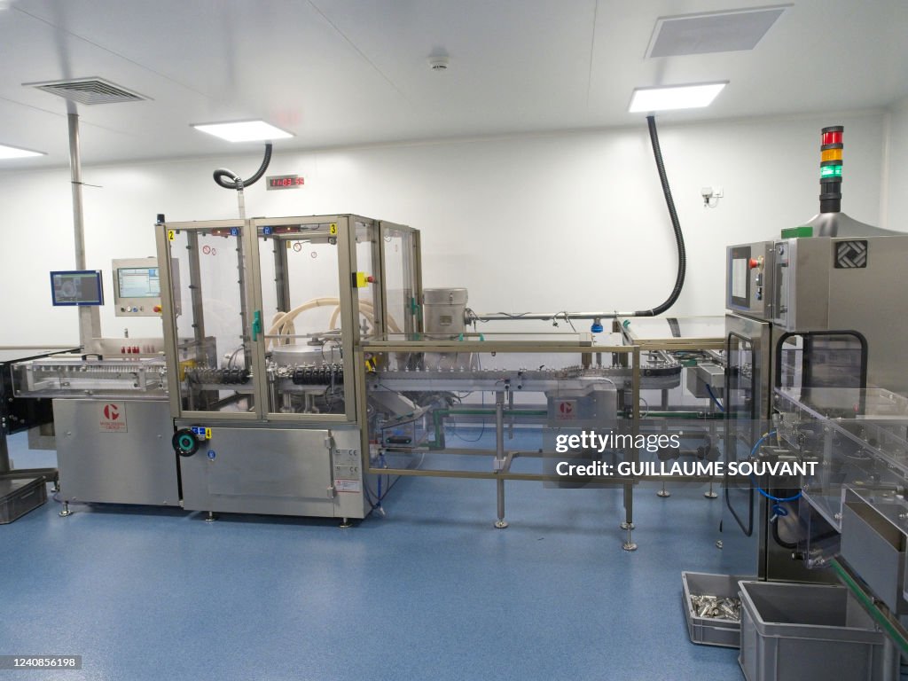 A photograph shows an assembly line inside the laboratory in La... News ...