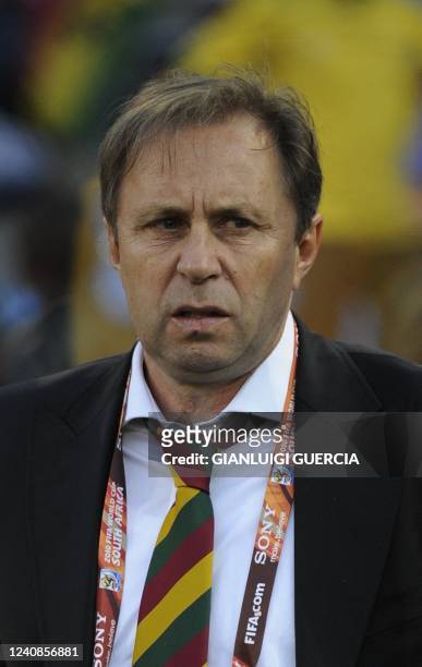 Ghana's coach Milovan Rajevac looks at his players during the Group D first round 2010 World Cup football match Serbia vs. Ghana on June 13, 2010 at...