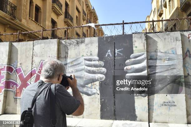 Walls and barriers, which are placed around the Parliament building for security purposes after the demonstrations held three years ago, are...