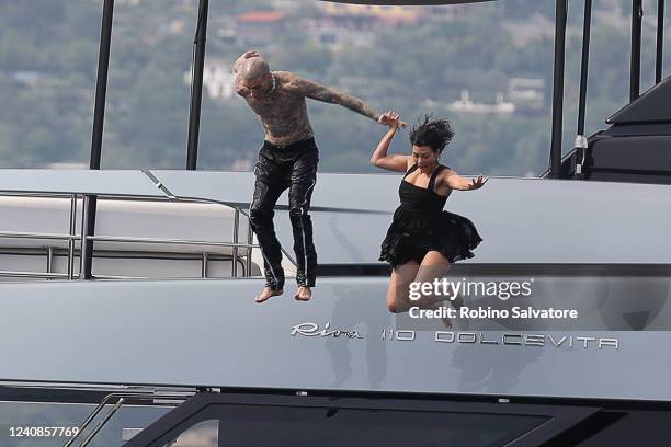 May 23: Kourtney Kardashian and Travis Barker are seen on May 22, 2022 in Portofino, Italy.