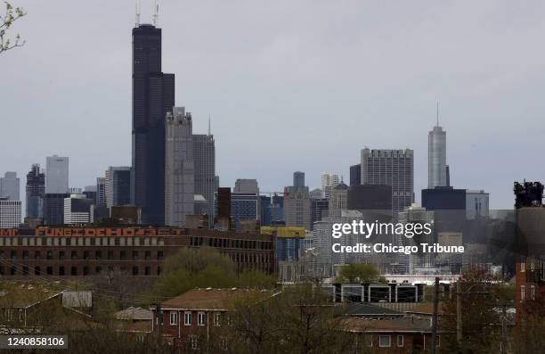 The Chicago skyline looms over the near south neighborhoods on May 8, 2022. Updated 2020 census numbers did not come with demographic or geographic...