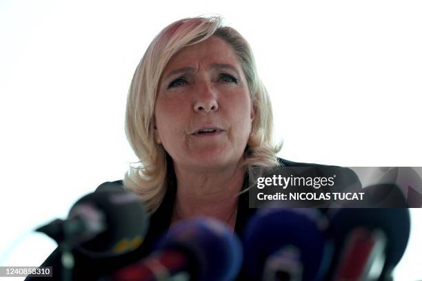 French far-right party Rassemblement National leader Marine Le Pen gives a press conference during a campaign visit to support the party's local...